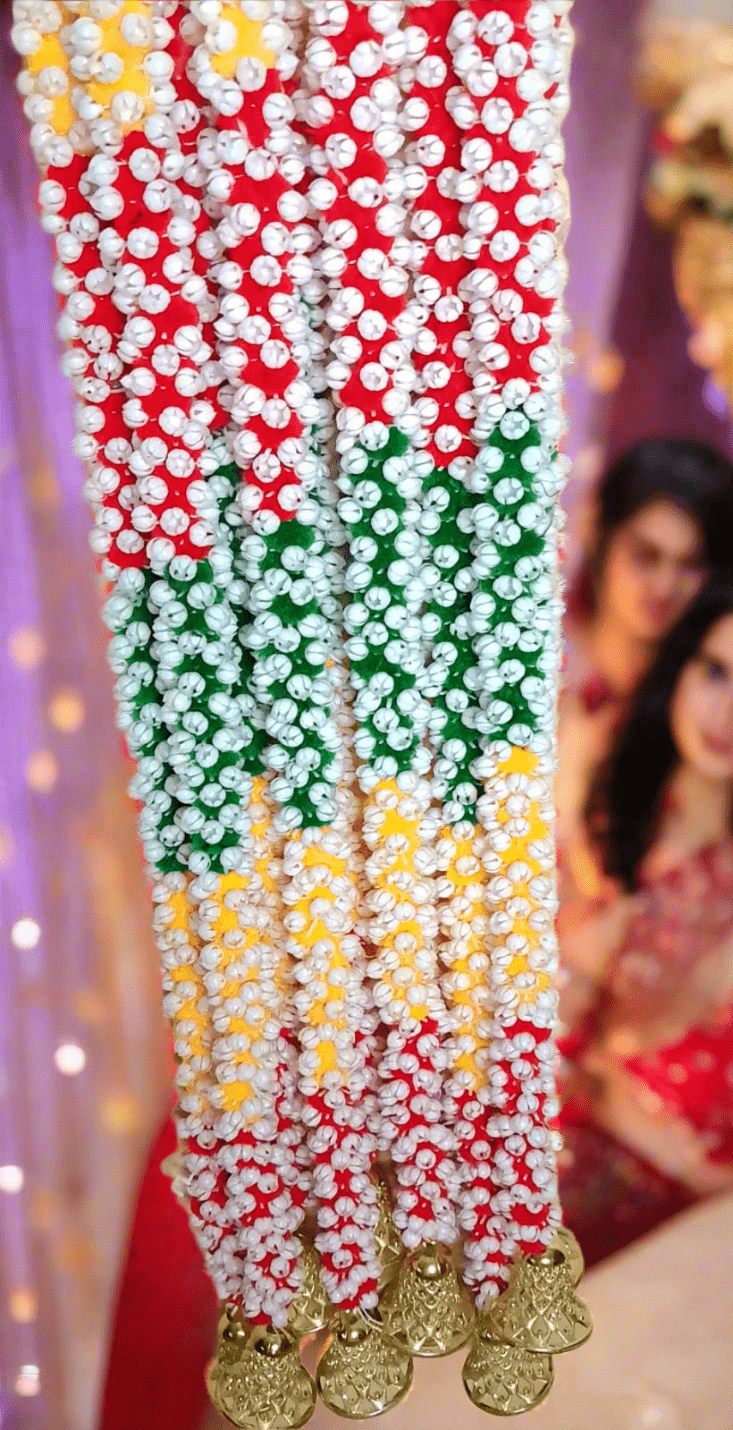 Colorful artificial flower garland strings for Diwali and wedding decor, perfect for festivals and home celebrations. - KRIDHA DECOR