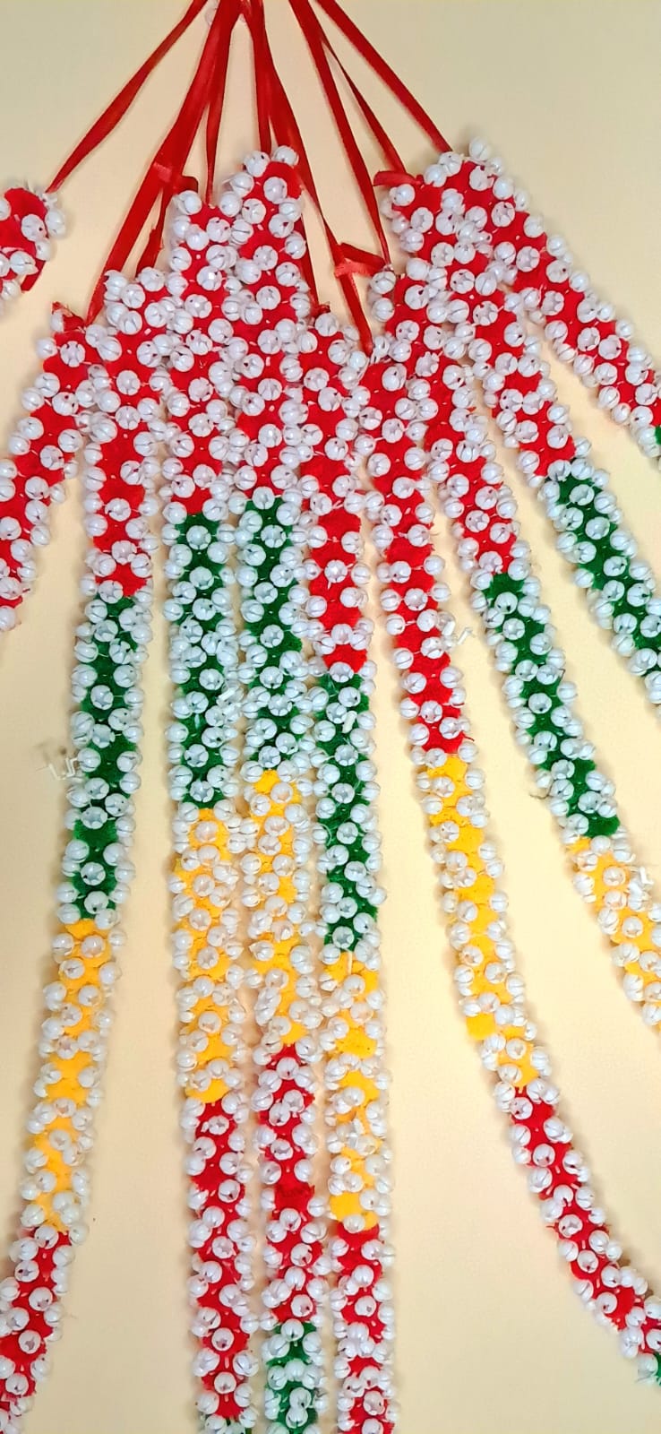 Colorful artificial flower garland strings for Diwali and wedding decor, perfect for festivals and home celebrations. - KRIDHA DECOR