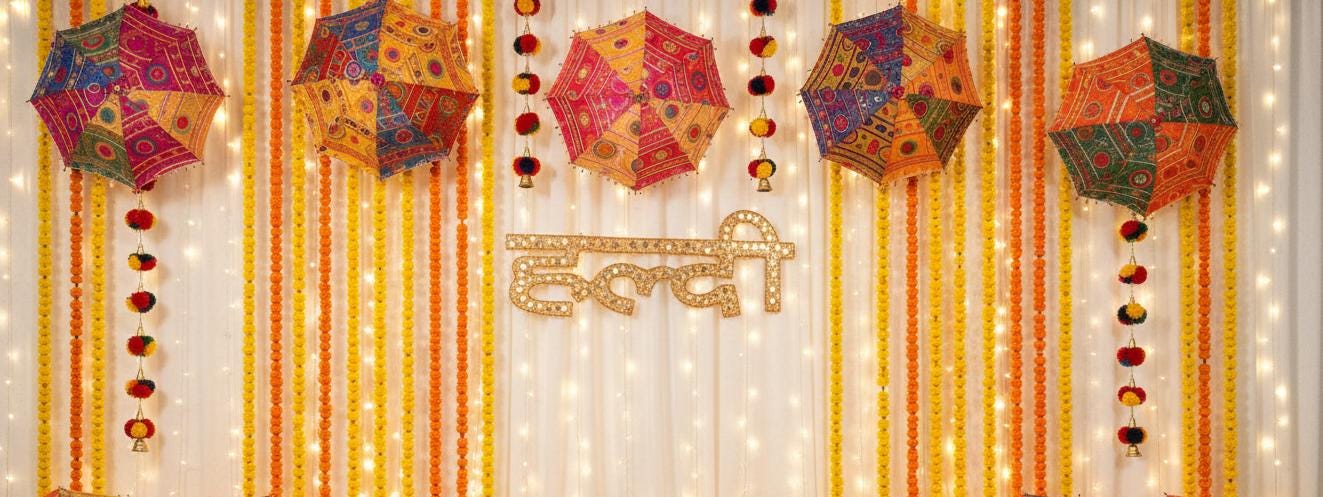 Haldi Mehndi Backdrop Decor Set – Umbrellas, Flower Strings, Potlis, Cushion Covers, Table Runner