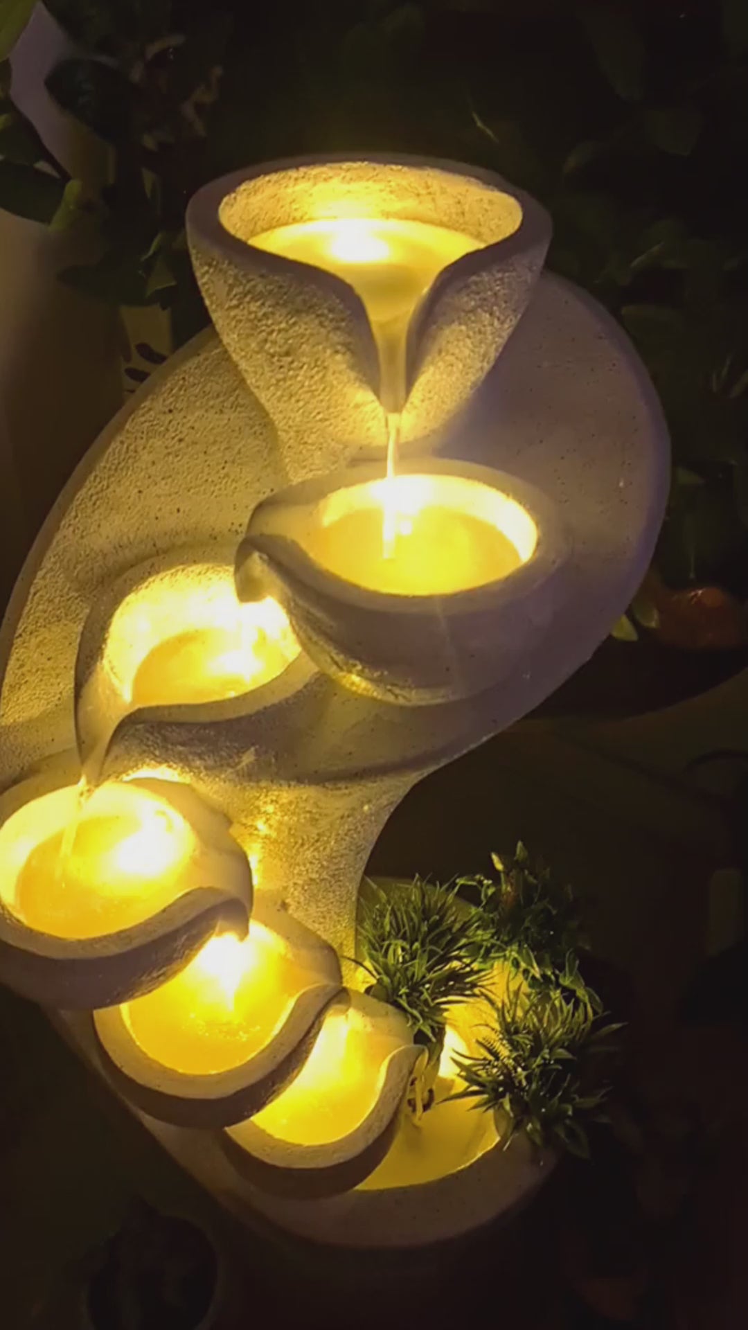 Tall indoor waterfall fountain with cascading water and LED lighting